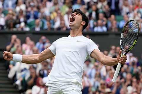 Carlos Alcaraz elebrates after defeating Daniil Medvedev